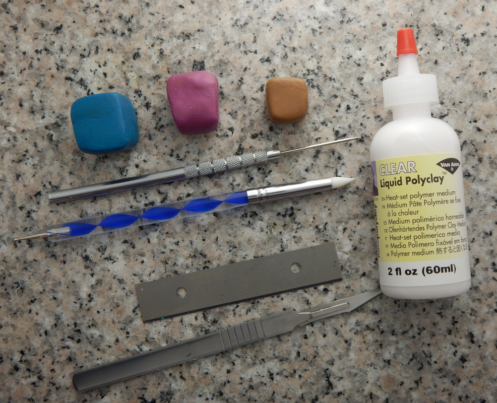 Three small blobs of clay, a needle tool, combination clay shaper and embossing tool, wallpaper scraper blade, scalpel, and bottle of liquid clay on a speckled grey background